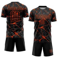 Maillot de football noir et orange personnalisé par sublimation